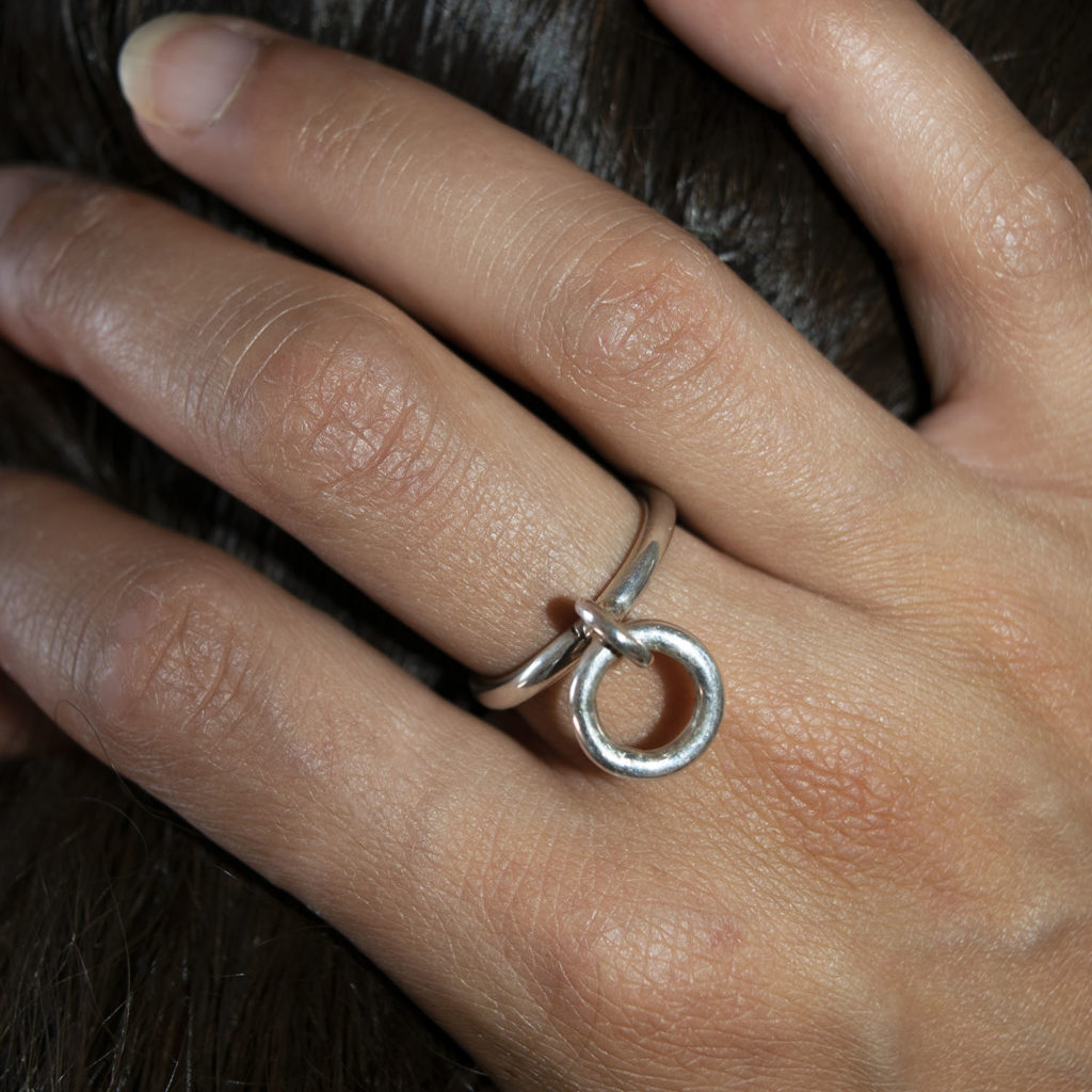 Bold ring with circle pendant